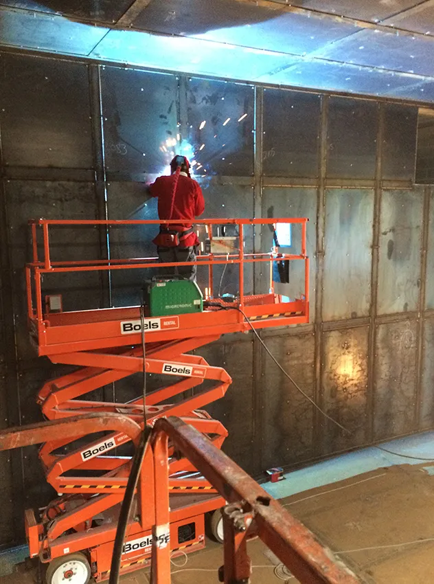 EMP shielded door with contact gasket system for a high performance shielded facility